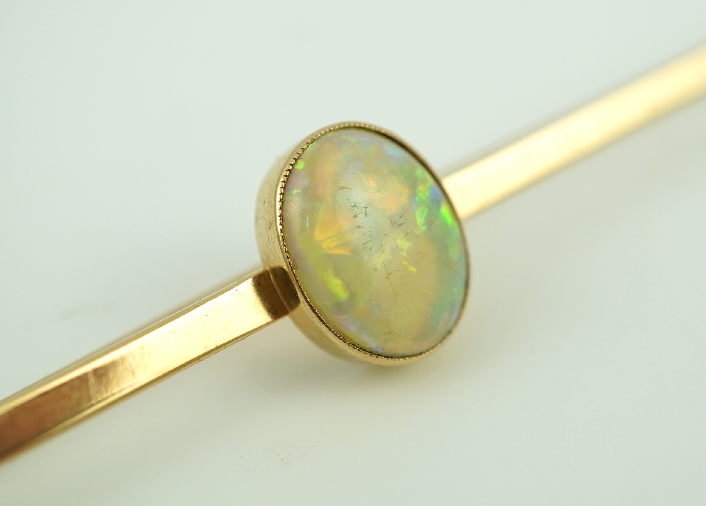 An Edwardian gold and opal brooch, early 20th century